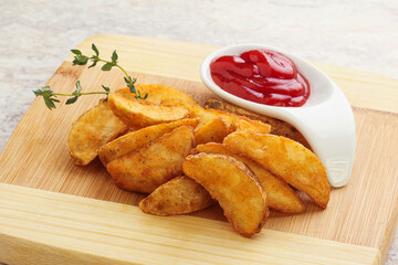 Fried rustic potato with tomato ketcup