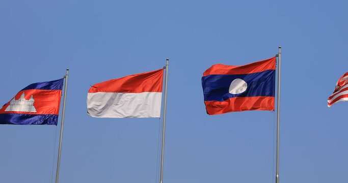 National Flags of ASEAN countries behind the sky in Ho Chi Minh panning