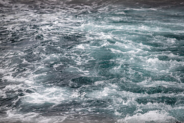 Fototapeta na wymiar Bubbling sea water, waves on the sea.
