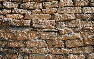 Wall of old stone bricks as an abstract background.
