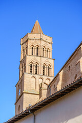 Fototapeta na wymiar Bell tower of Saint Nicolas church in Saint Cyprien District, Toulouse, France