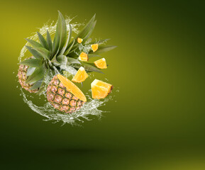 Water Splash On fresh pineapple With Leaves Isolated On green Background Premium PSD