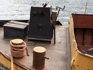 Mooring rope of a boat tied to a bollard.