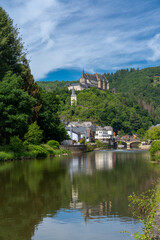 Fototapeta na wymiar vertical view of the picturesque village and castle of Vianden on the Our River in Luxembourg
