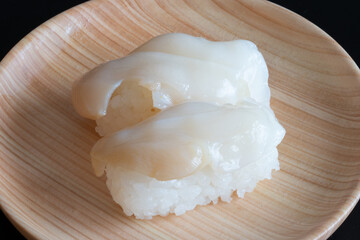 shell on a wooden plate