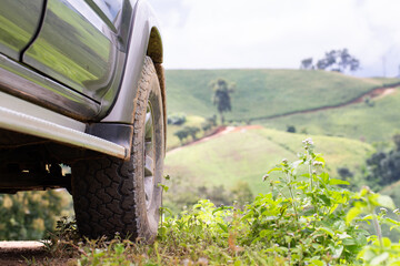 Offroad car  on the mountains, offroad travel  and driving concept.