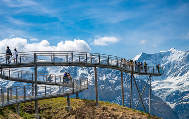 View of  sky cliff walk metal bridge at First peak above Grindelwald village.  Jungfrau region,...