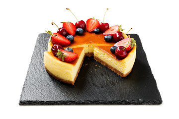 Souffle cheesecake dessert with fresh berries . isolated on white background.