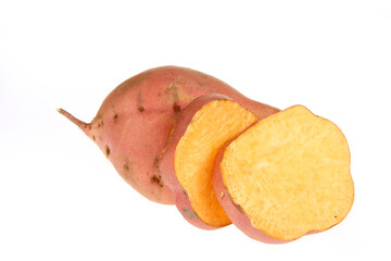 Ripe sweet potatoes on a white background