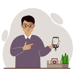 Happy man holds a glucometer in his hand. The concept of blood sugar control, diabetic.