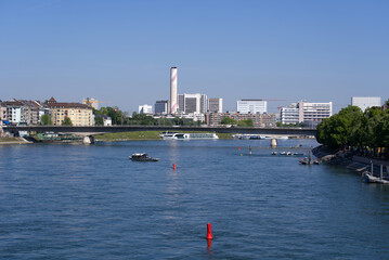 Rhine River at City of Basel with Johanniter Bridge in the background on a sunny spring day. Photo taken May 11th, 2022, Basel, Switzerland.