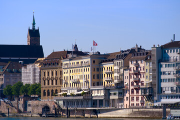 Cityscape of the old town of Basel with Rhine River in the foreground a sunny spring day. Photo taken May 11th, 2022, Basel, Switzerland.