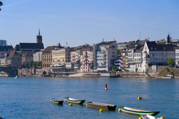 Cityscape of the old town of Basel with Rhine River in the foreground a sunny spring day. Photo taken May 11th, 2022, Basel, Switzerland.