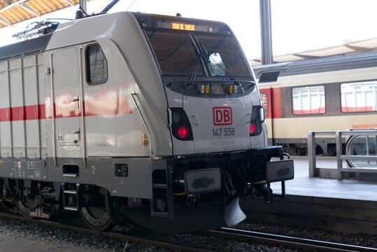 Stationary train of German DB at railway station Basel SBB on a sunny spring day. Photo taken May 11th, 2022, Basel, Switzerland.