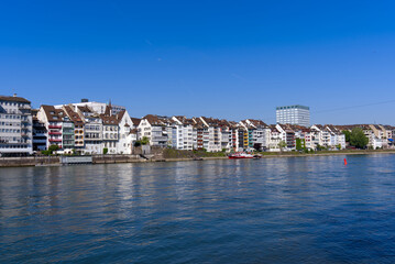 Fototapeta na wymiar Rhine River at City of Basel with scenic view on a sunny spring day. Photo taken May 11th, 2022, Basel, Switzerland.