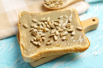 Obraz na płótnie Canvas Homemade sunflower seeds butter or spread. Sunflower butter is a new trend and a great alternative to nut butter.