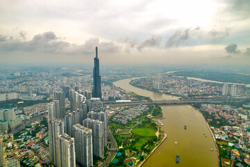 Aerial view of Ho Chi Minh City skyline and skyscrapers in center of heart business at downtown. Cityscape on Saigon river in Ho Chi Minh City, Vietnam
