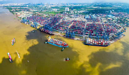 Aerial view of Cat Lai port with cargo ship and container Ho chi Minh city, Vietnam. The port is an important hub for import and export of important goods in Ho Chi Minh City