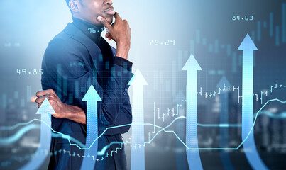Black businessman with pensive look, arrows and candlesticks, growth