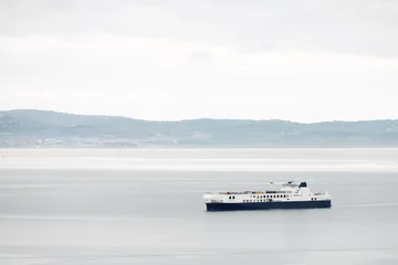 Fototapeten Image of a ferryboat on the sea © Rechitan Sorin