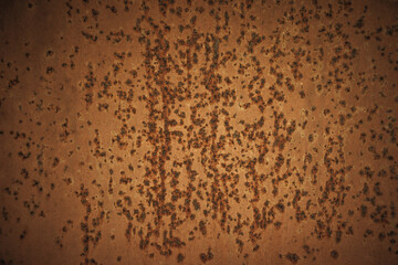 Photo of the rust texture on the wall.Rusty metal background in red for the inscription. Corrosion of metal. The fight against rust on the metal surface.