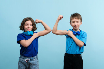 Children Showing Off Biceps
