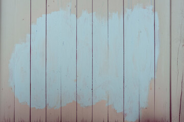 Wooden texture background. Pink wall with blue brush strokes. Abstract thought bubble. Dark pastel backdrop for design. Worn, aged, scratched and weathered wood board surface. Close up, copy space