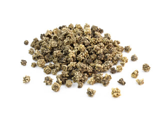 Pile of beetroot seeds isolated on white background. Dried seeds close up. Dry brown selective beetroot seeds.