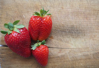 strawberry fruit food on chopping board