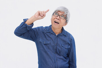 Asian senior man in casual style  thinking about something and got an idea isolated on white background. Aha moment. 