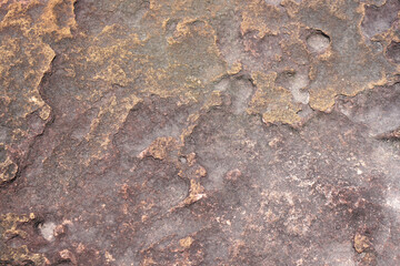 stone background was eroded by the wind creating a beautiful pattern. marble background with text