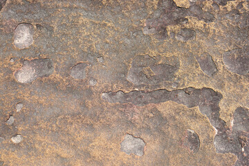 stone background was eroded by the wind creating a beautiful pattern. marble background with text