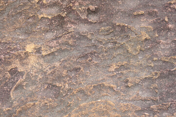stone background was eroded by the wind creating a beautiful pattern. marble background with text