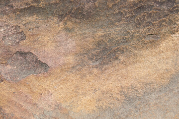 stone background was eroded by the wind creating a beautiful pattern. marble background with text