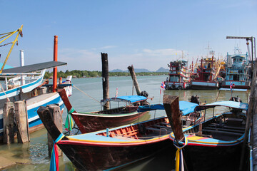 Fishing boats floating in the calm seas are a way of life in Asia.