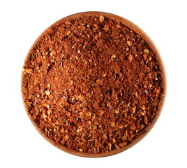 Spicy chili pepper flakes, crushed, milled dry paprika pile in clay pot isolated on white, top view
