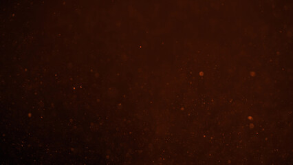 real dust particles in air with back light over black background