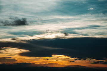 The view from the top of the mountain at sunset, taken from a bird's eye view