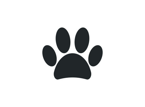 Dog or cat paw. Black paw print isolated on white background.