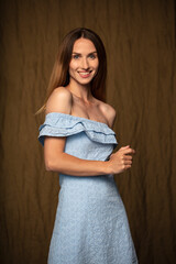 Fototapeta premium studio portrait on a dark background of a beautiful young woman