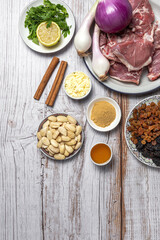 Raw ingredients and spices of traditional lamb stew or tagine