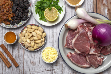 Raw ingredients and spices of traditional lamb stew or tagine