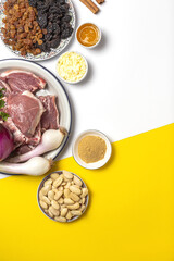 Raw ingredients and spices of traditional lamb stew or tagine