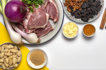 Raw ingredients and spices of traditional lamb stew or tagine