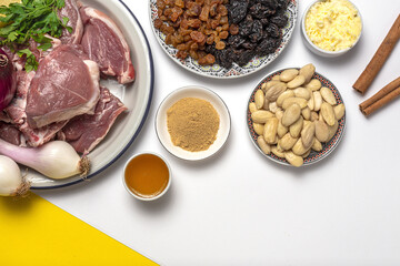 Raw ingredients and spices of traditional lamb stew or tagine