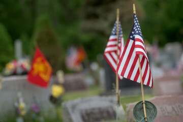 Flags placed on the Graves of Veterans at Knox Cemetery in Ouaquaga in Upstate NY.  Memorial Day Tribute with American Flags at Military Graves.