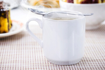 coffee and milk, a typical Brazilian drink, served hot for breakfast in restaurants and bakeries, or made at home. Brazilian culture