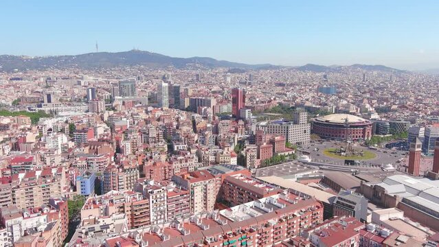 Barcelona, Spain: Aerial view of capital city of Catalonia, famous square Plaza Espa&ntilde;a (Pla&ccedil;a d'Espanya) and bullring Arenas de Barcelona, sunny day, blue sky - landscape panorama of Europe from above