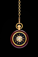 Pocket watch on the black background