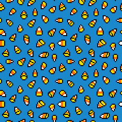 Pixel art candy corns on blue background. Sweet Halloween treats seamless pattern. Old school vintage retro 80's-90's 8 bit slot machine, video game graphics. 8 bit autumn holiday snack print.